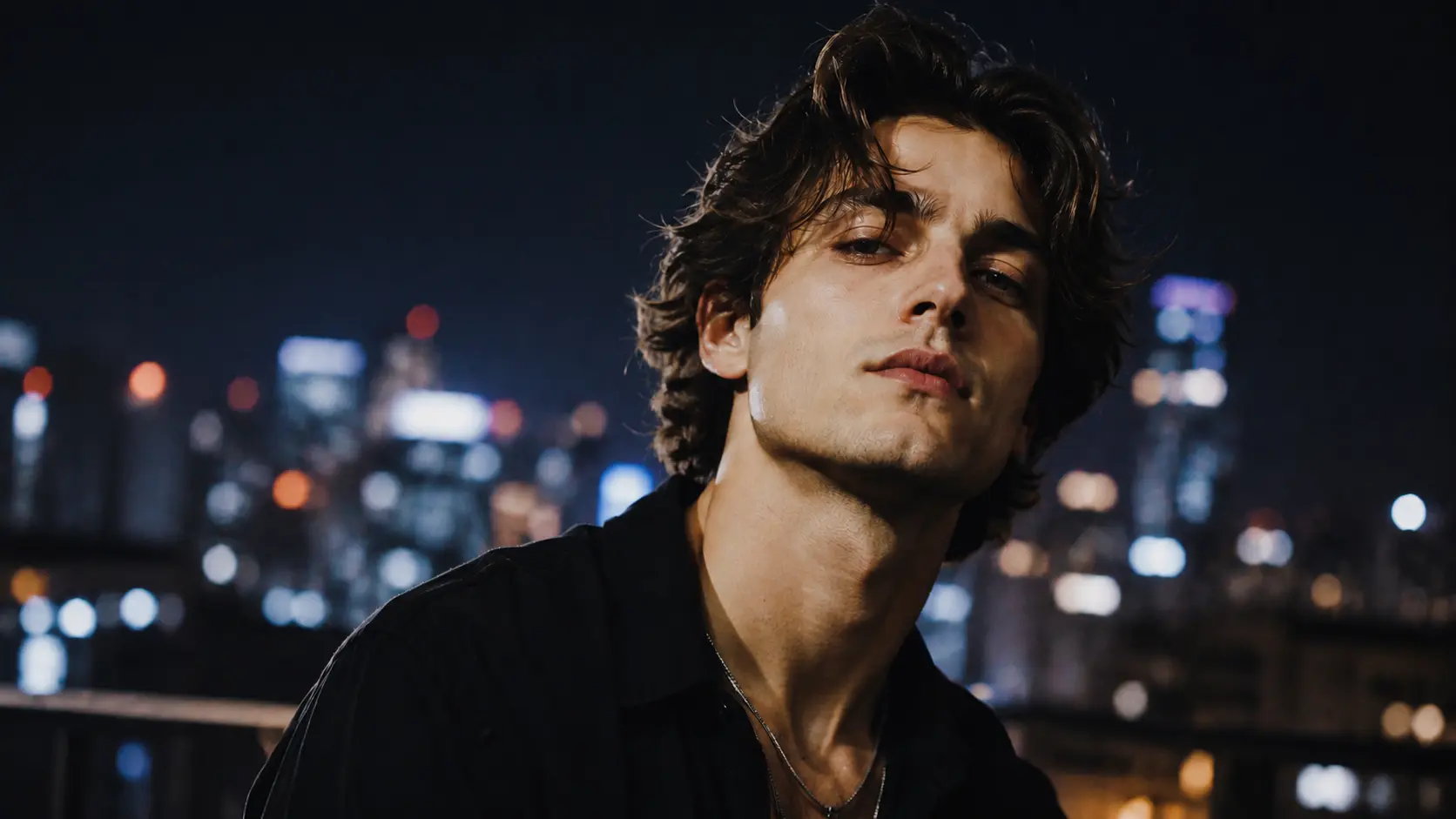 The same portrait placed against a city skyline at night after the background is changed.