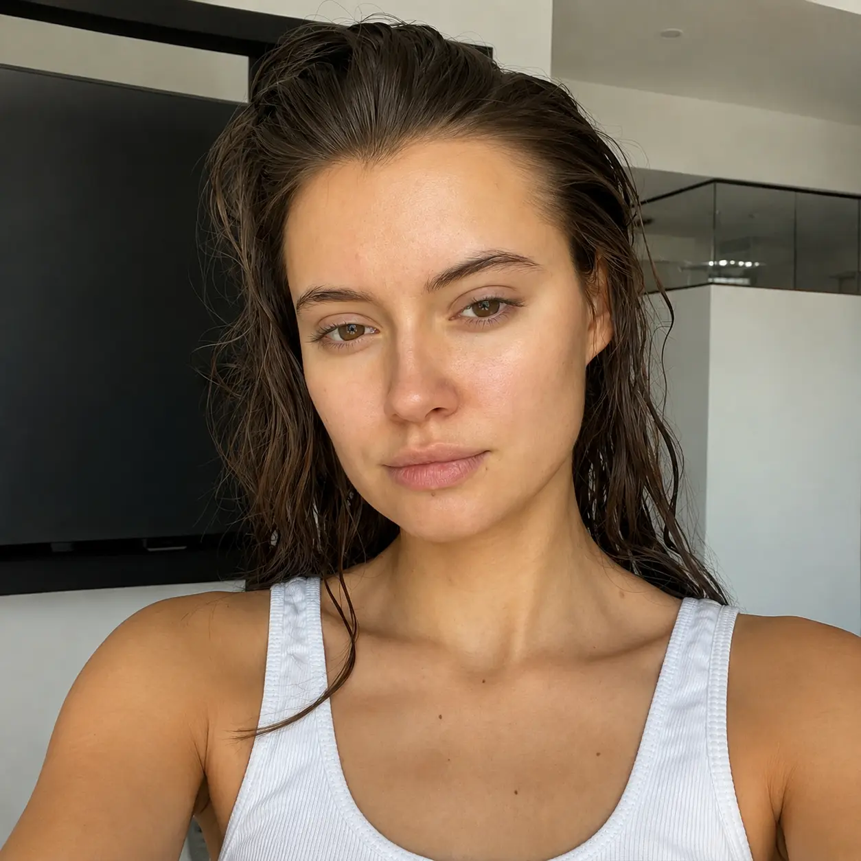 Natural wet-hair portrait before AI beauty editing