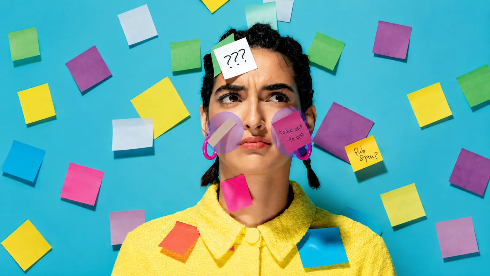 Portrait with sticky notes marked for removal from the face