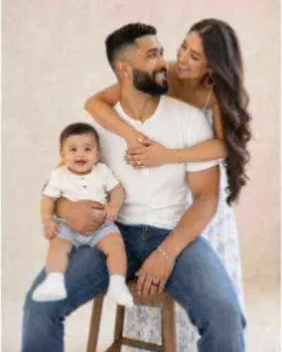 A softly focused family portrait before clarity improvement.
